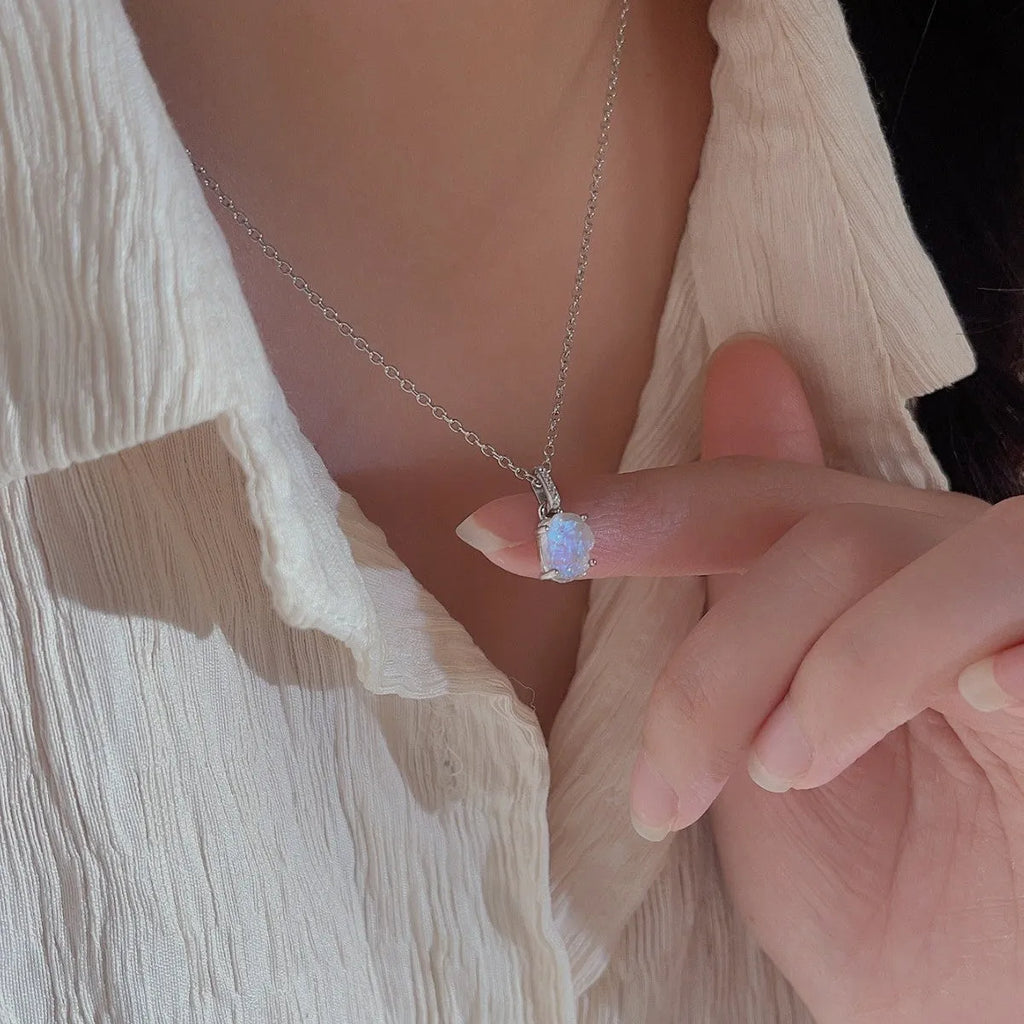 S925 sterling silver geometric moonstone pendant necklace with curb chain on white background