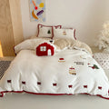 Winter Christmas cartoon bedding four-piece set with Snowflake Milk Pastry pattern on polyester duvet cover and pillowcases