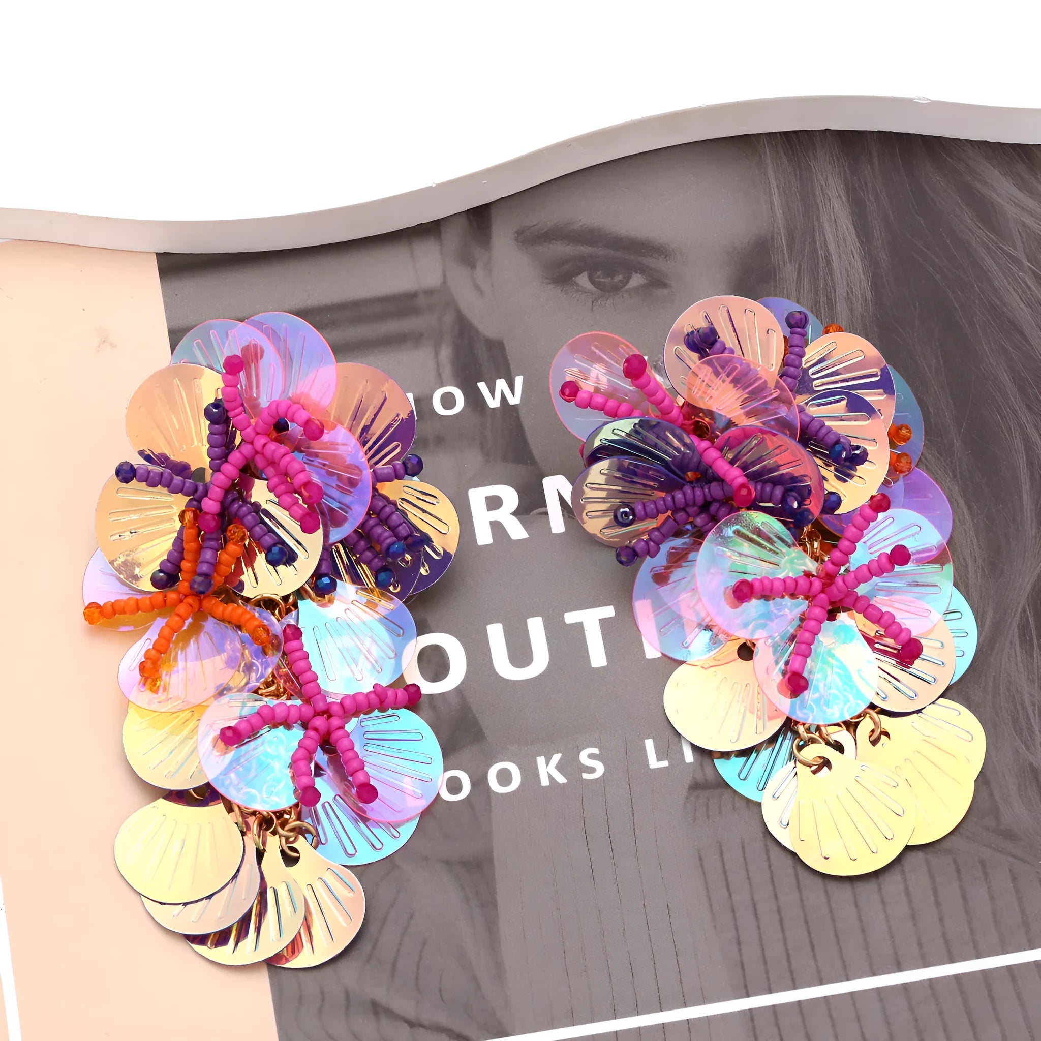 Handmade colourful string bead flower and leaf earrings in exaggerated dopamine style.