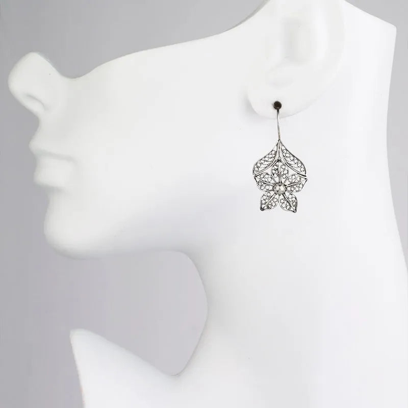 Silver alloy hollow flower leaf-shaped earrings for women retro simple style