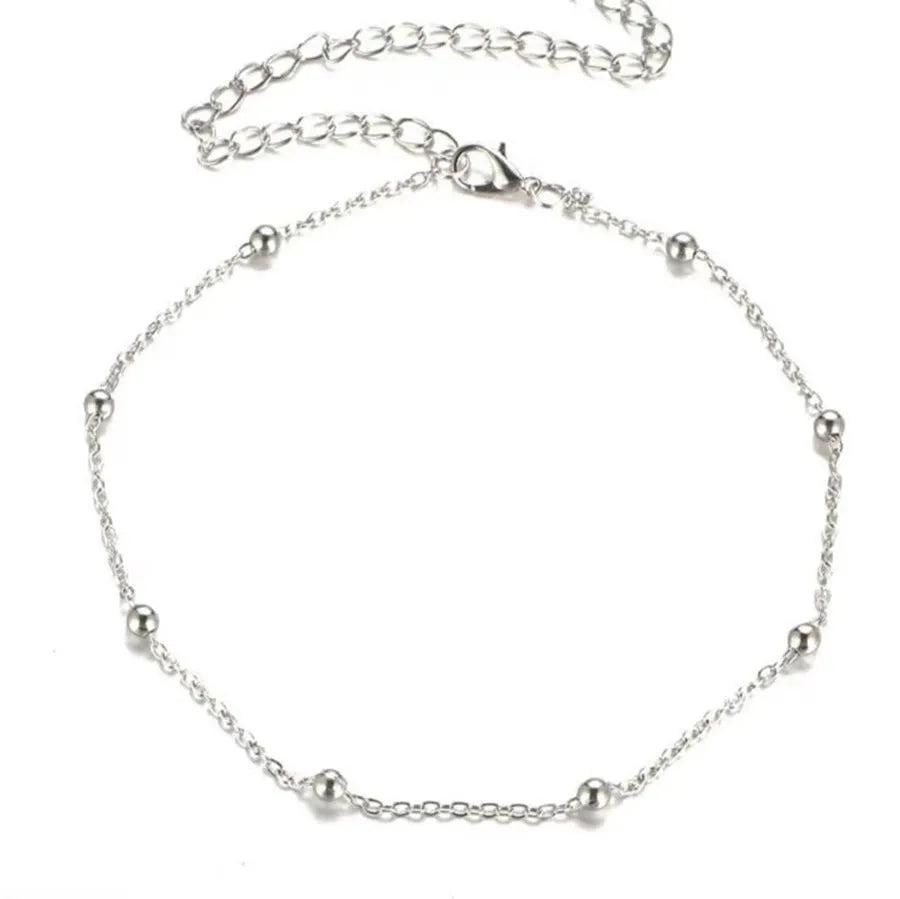 Bohemian metal anklet with twisted chain and geometric pendant in gold or silver