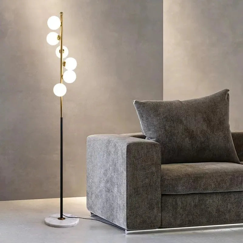 154cm tall floor lamp with wrought iron glass construction and ironwork base