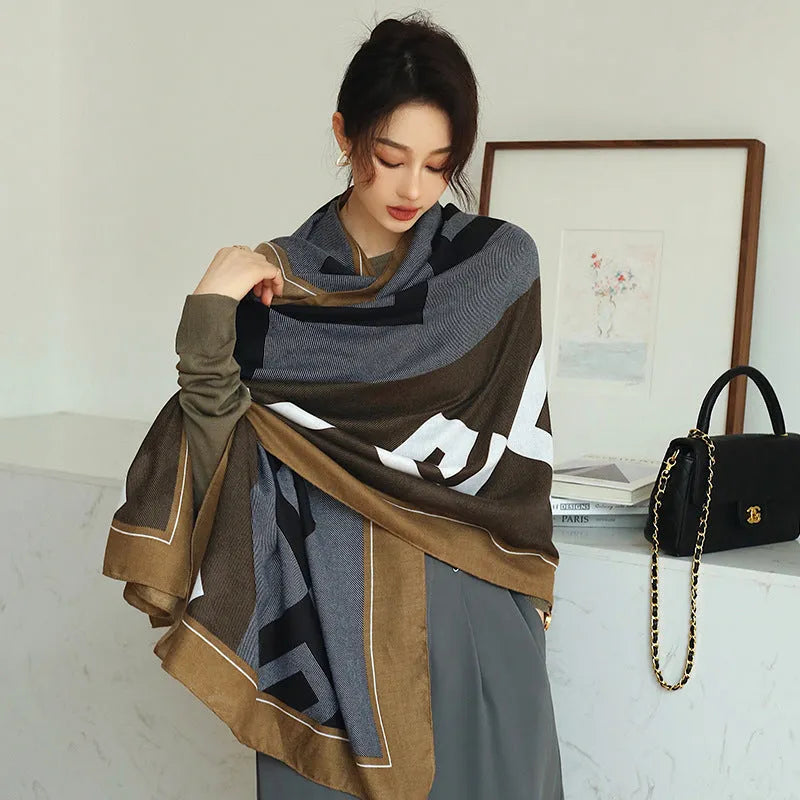 Women's printed polyester scarf showing 180cm length and 90cm width dimensions with autumn-appropriate design