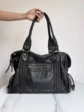 French retro women's motorcycle messenger bag in brown with weaving pattern detail and single shoulder strap