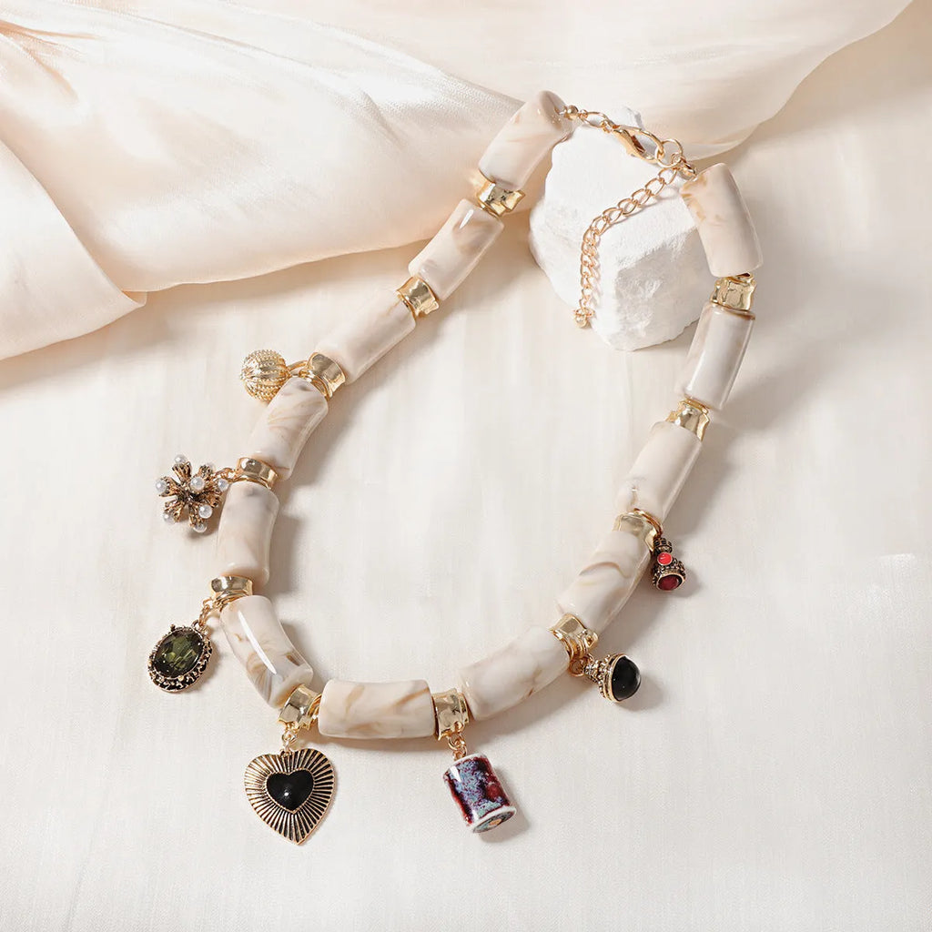 Heart-shaped resin bamboo pendant necklace with electroplated finish