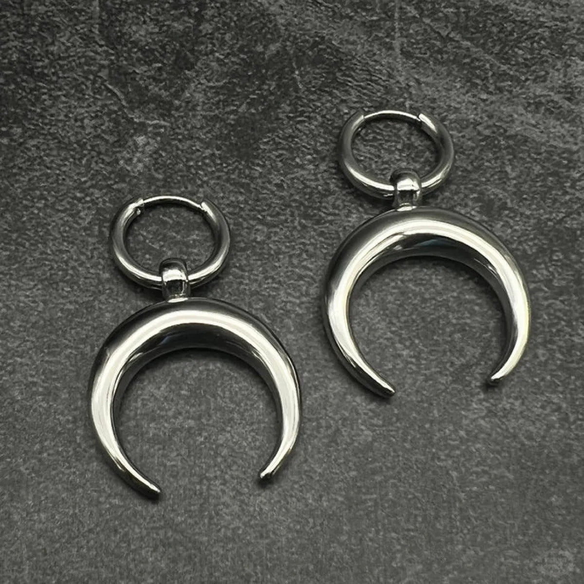 Vintage gothic moon hoop earrings with silver electroplated finish and clip-on fitting
