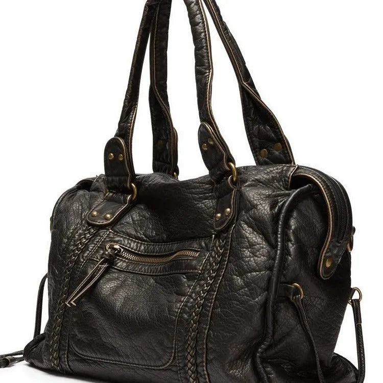 French retro women's motorcycle messenger bag in brown with weaving pattern detail and single shoulder strap