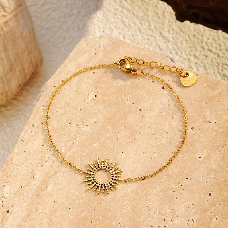 SUNFLOWER series women's gold geometric chain necklace and bracelet jewellery set on display