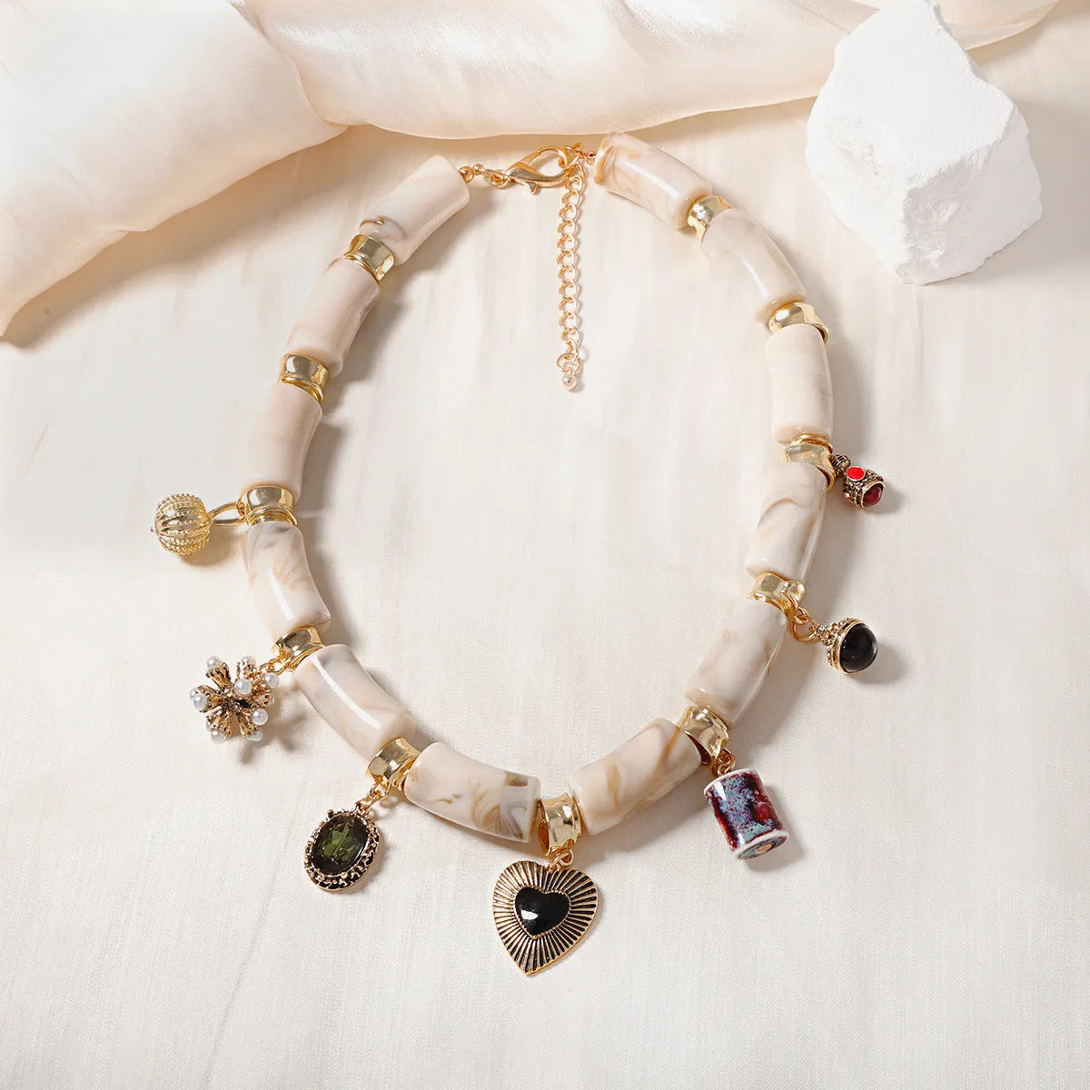 Heart-shaped resin bamboo pendant necklace with electroplated finish