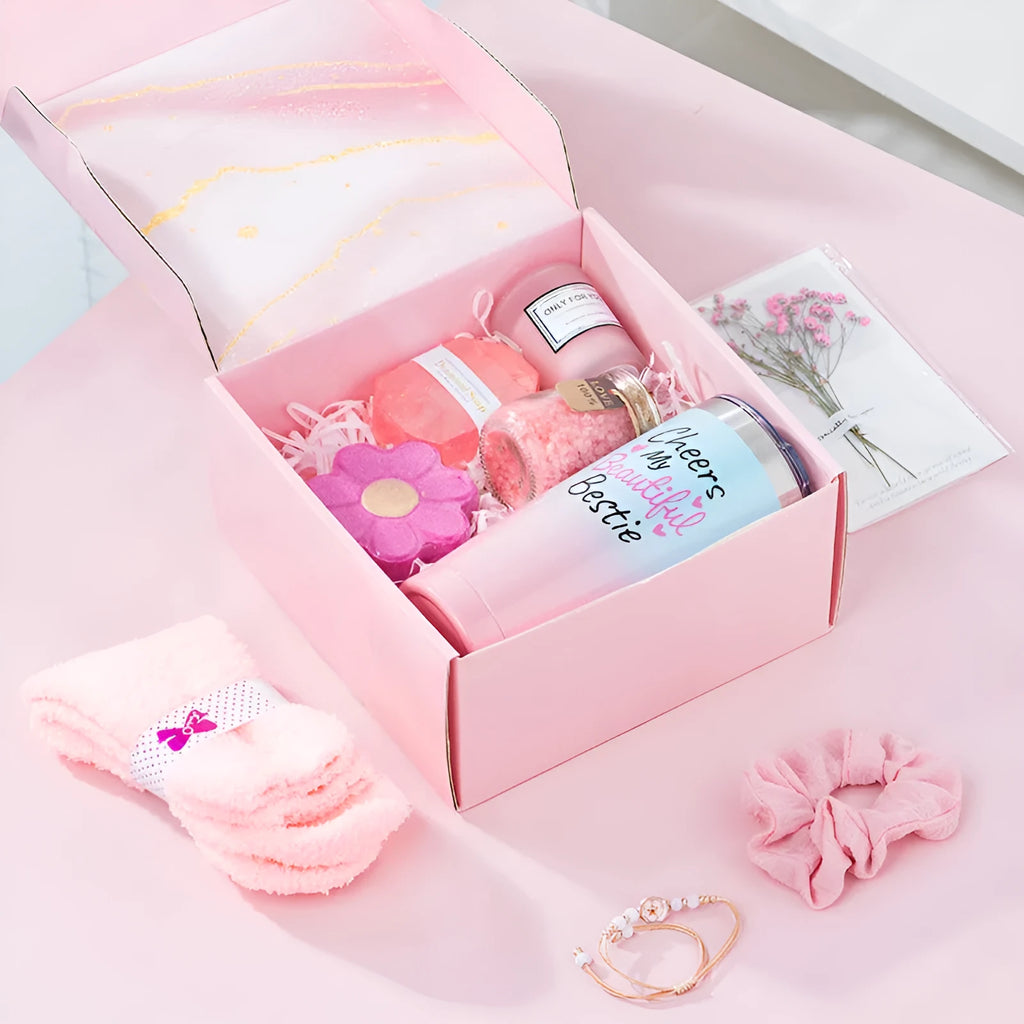 Aromatherapy gift box containing soy wax candles and bath products in modern simplicity design.