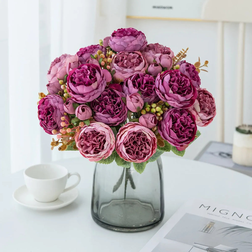 Artificial silk peony bouquet in a champagne colour for home or wedding decoration.
