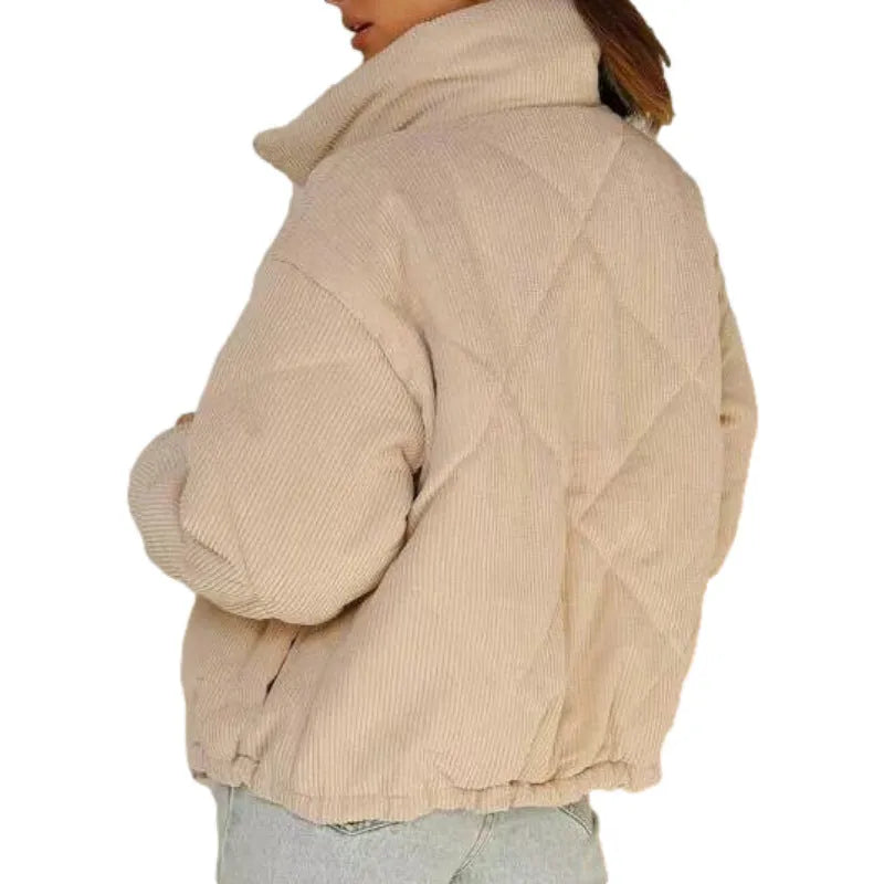 Women's apricot corduroy wadded jacket with stand collar and full-length front zipper showing street fashion styling
