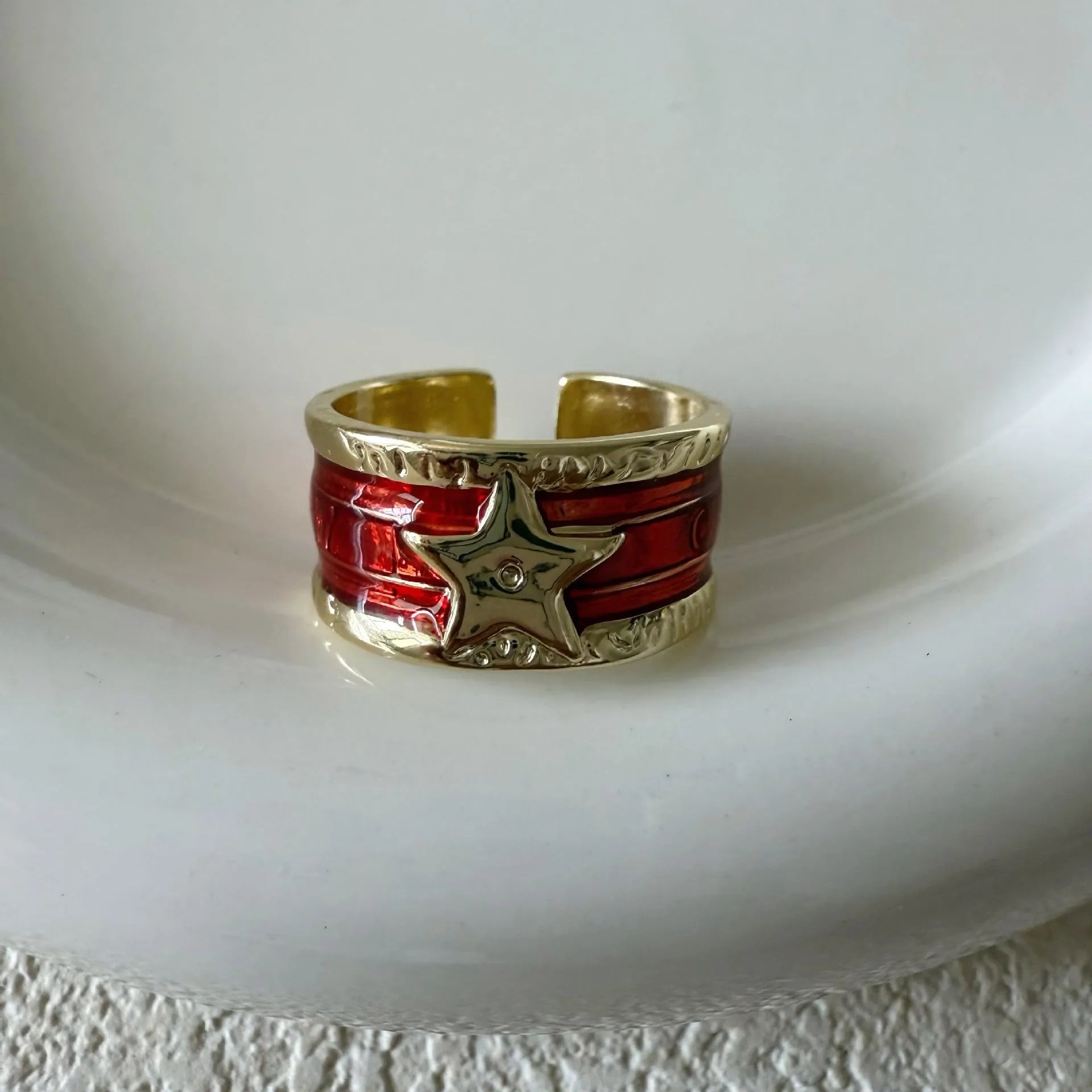 Adjustable copper ring with a distressed geometric drop oil design in a choice of colours.