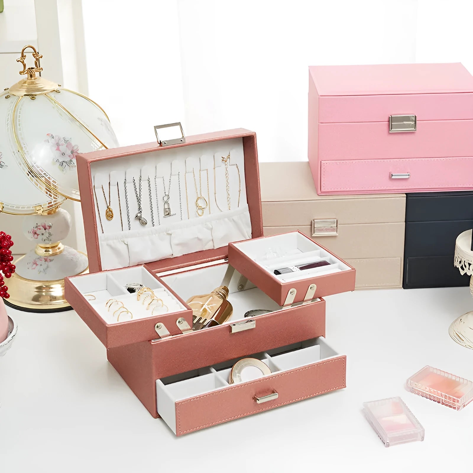 Hard PU leather jewellery storage box with velvet-lined interior compartments in beige colour.