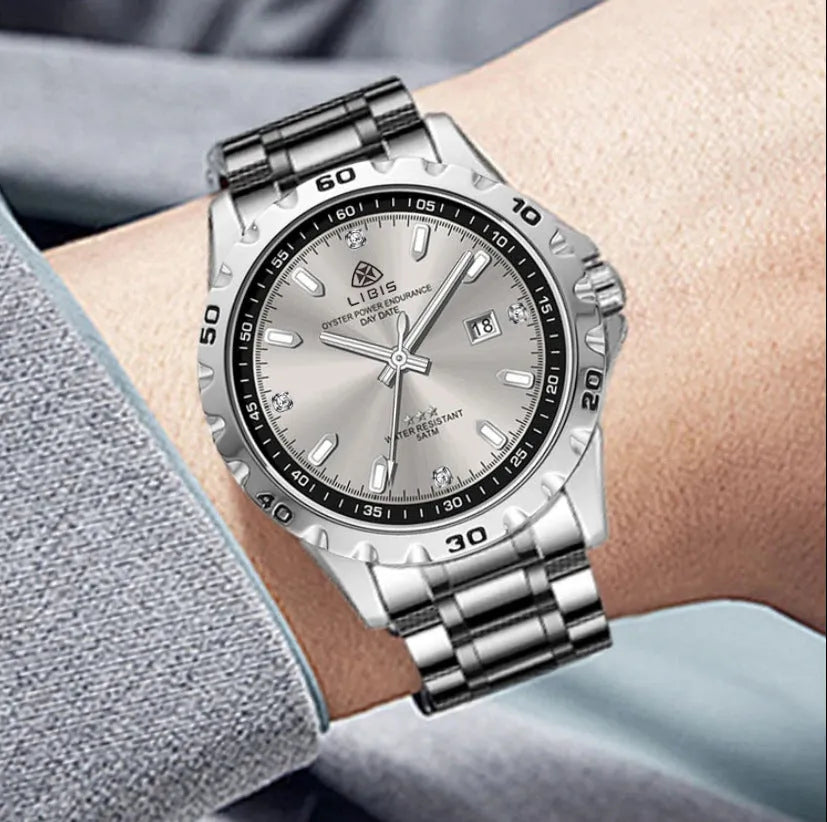 Men's silver quartz watch with luminous hands and stainless steel strap
