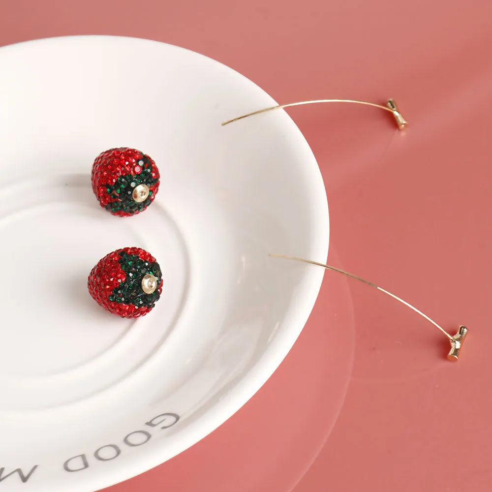 Geometric zinc alloy stud earrings with a strawberry design in red spot drill finish.