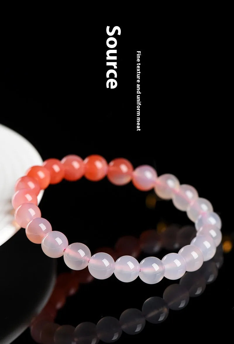 Natural gradient Yanyuan agate bracelet in a unisex geometry style on a wrist.