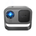 Black HD portable projector with remote control on home office desk