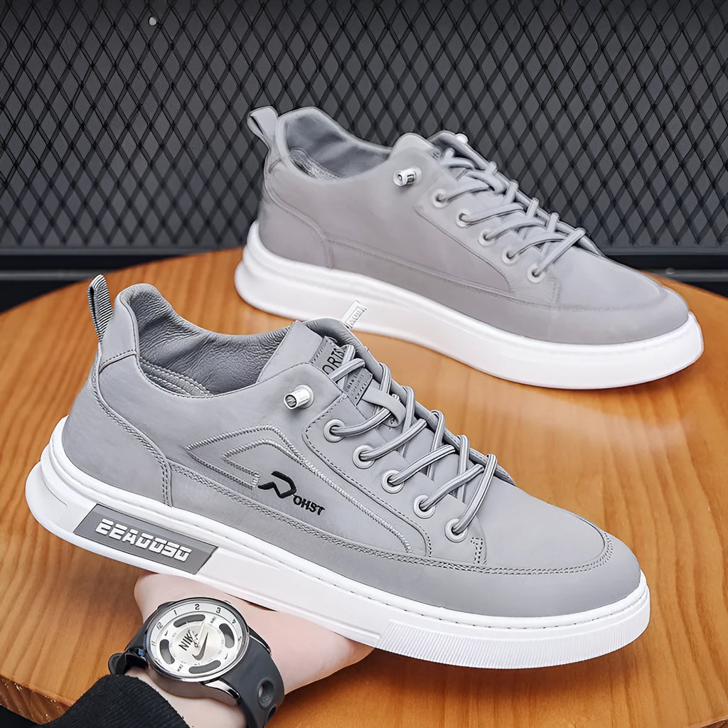 Men's grey casual shoes with canvas upper, leather lining, rubber sole, low-top, and lace-up front