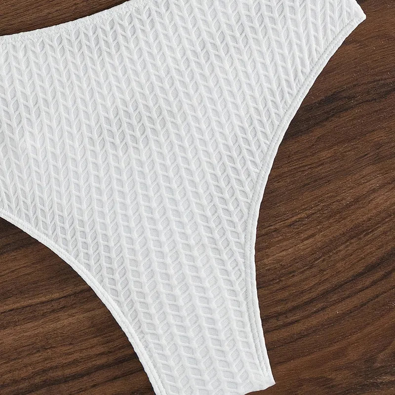 White women's backless bikini set with solid colour, polyester fabric, and spandex lining, available in sizes XS to L