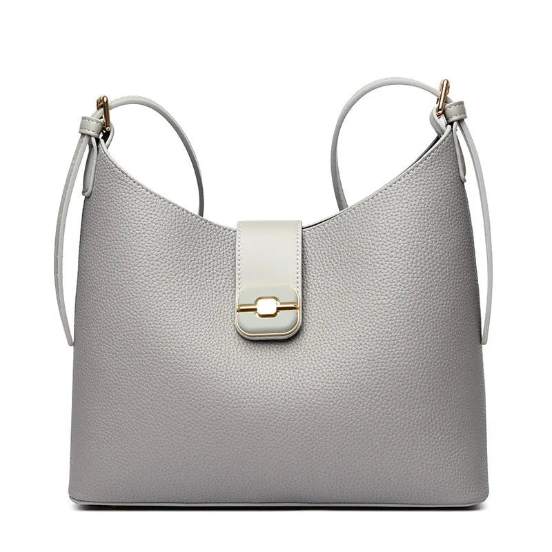All-matching Simple Large-capacity Bucket Bag in PU material, available in four colours: black, gray, biscuit, milky white
