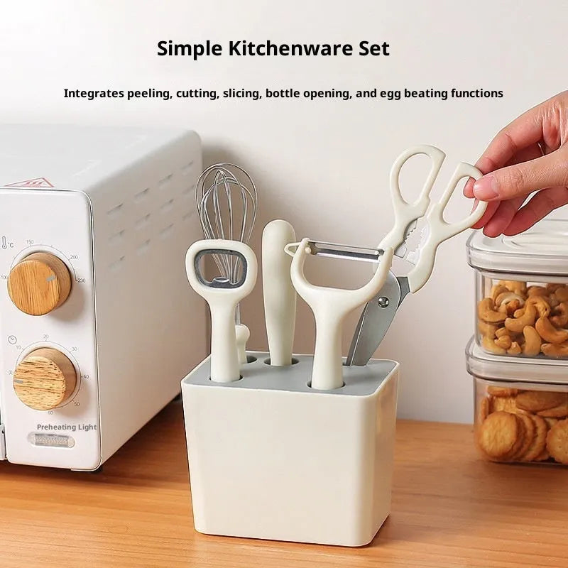 Six-piece white stainless steel kitchen gadget set with modern simplicity design on a clean surface