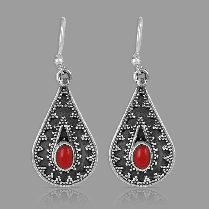 Silver water drop earrings with red pine gemstone centre on zinc alloy body