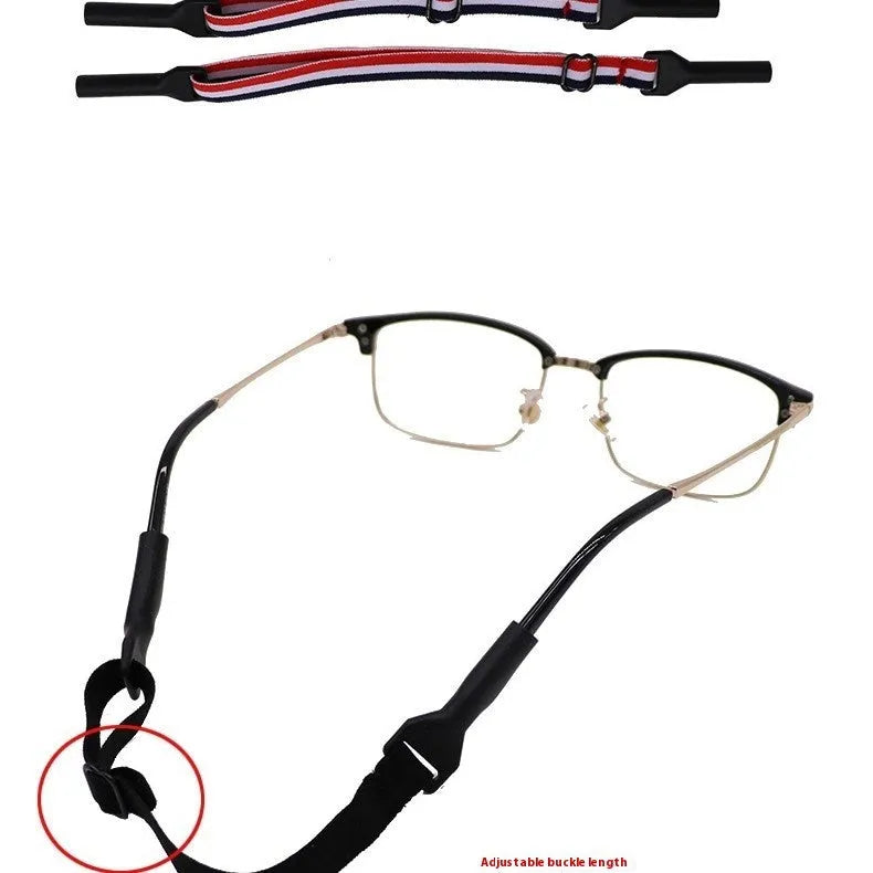 Black adjustable glasses cord with silicone end pieces shown on a pair of spectacles.