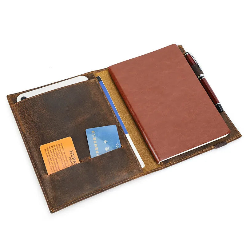 Brown Crazy Horse leather protective sleeve for an A5 notebook, showing square shape and socket closure.