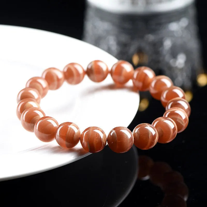 Natural Peruvian old mine rhodochrosite round bead bracelet with geometric design