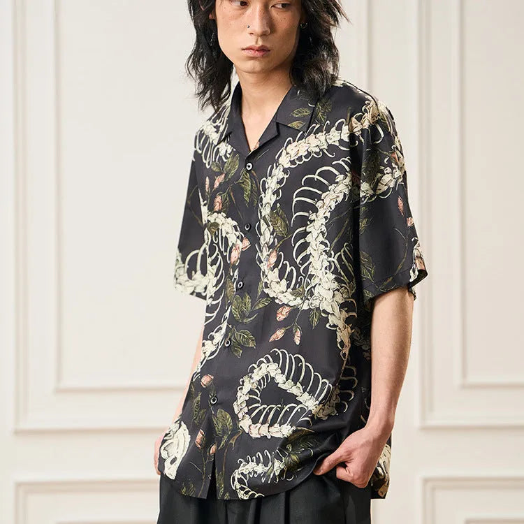Short sleeve Cuban collar shirt with original snake bone and floral pattern print in a loose fit.