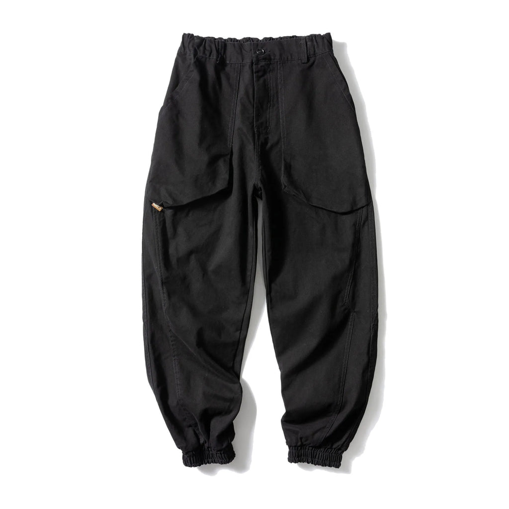Solid colour cotton tapered casual pants with ankle ties, loose fit, available in black and khaki.