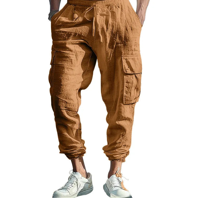Men's loose fit linen casual trousers with ankle-tied tether and multiple pockets in an earthy colour.