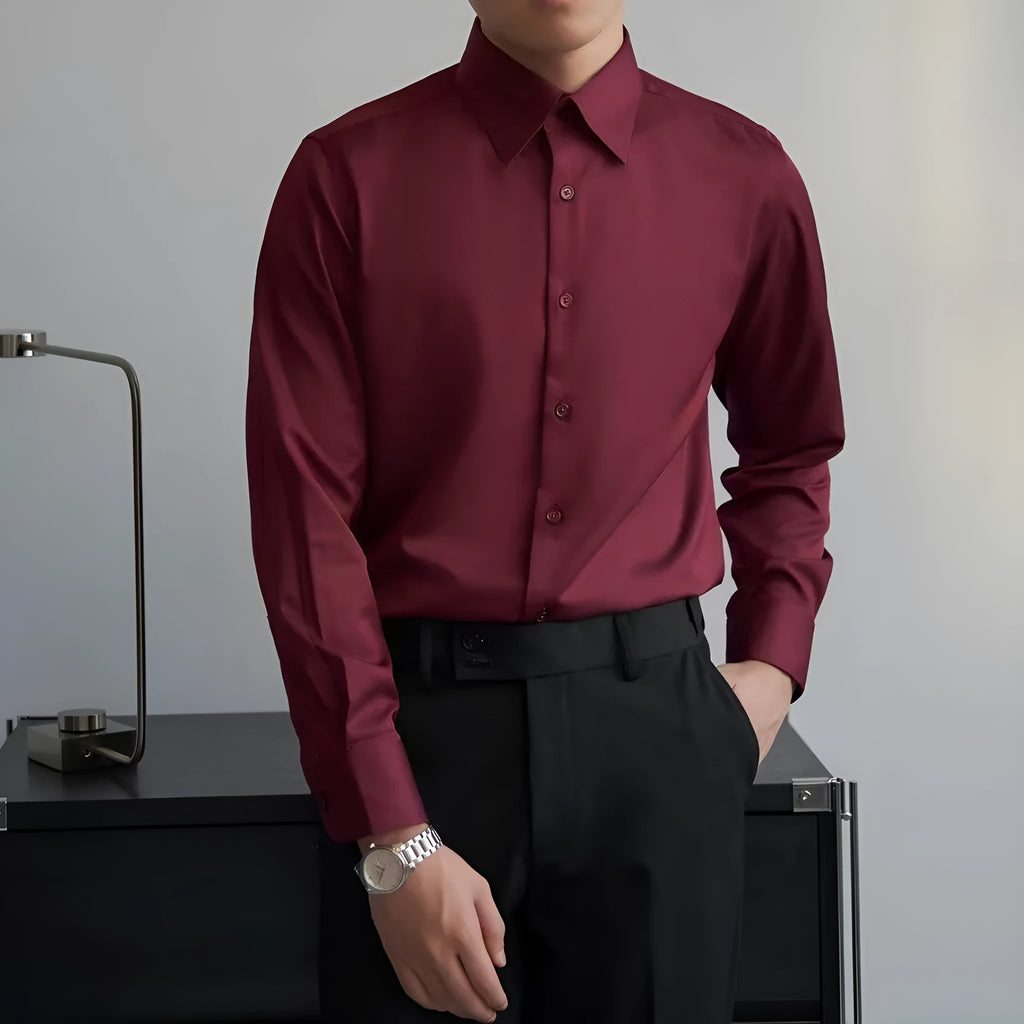 Man wearing a black long sleeve Korean-style cardigan shirt with a loose fit.