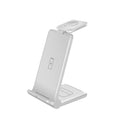 White foldable 3-in-1 wireless charging station dock for iPhone, Samsung phone, Apple Watch, and AirPods.