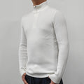 Men's black half-turtleneck zip-up pullover sweater with long sleeves on a model.