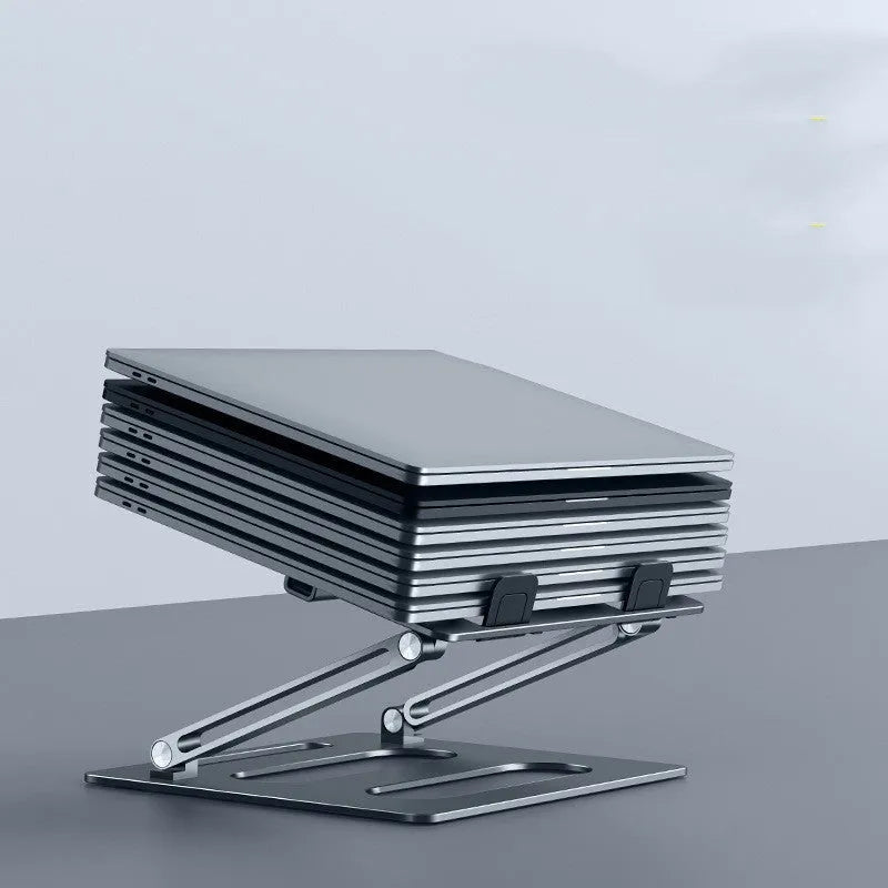 Silver adjustable aluminum laptop stand with laptop on desk at 340mm height