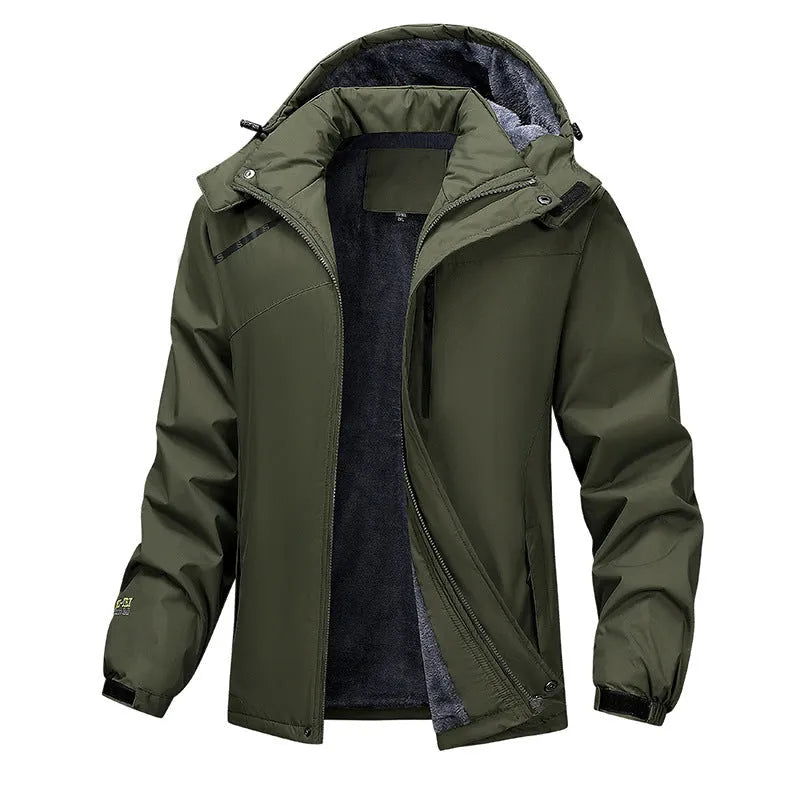 Man wearing a dark grey waterproof hooded plus-size coat outdoors.