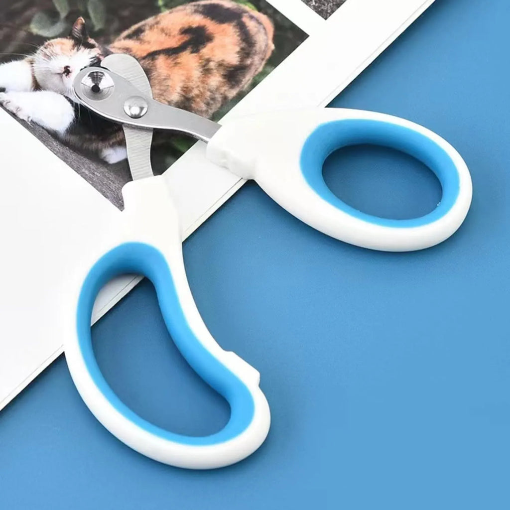 Blue cat nail clippers with circular hole design and cushioned non-slip handle for safe pet trimming