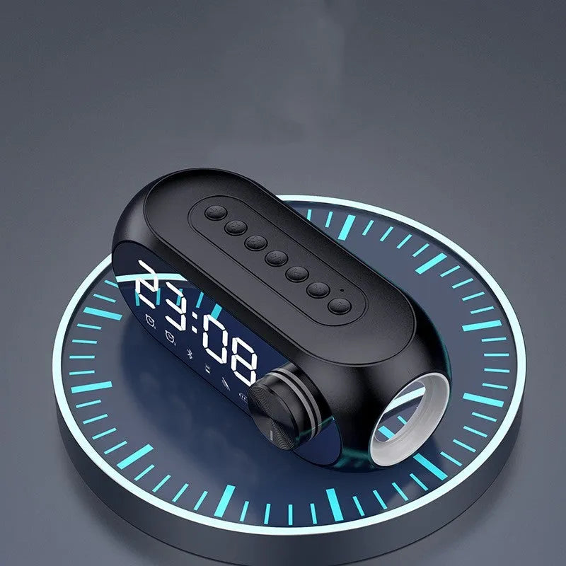 Extra Bass Portable Mini Clock Speaker in S8 Black colour on a desk with USB cable.
