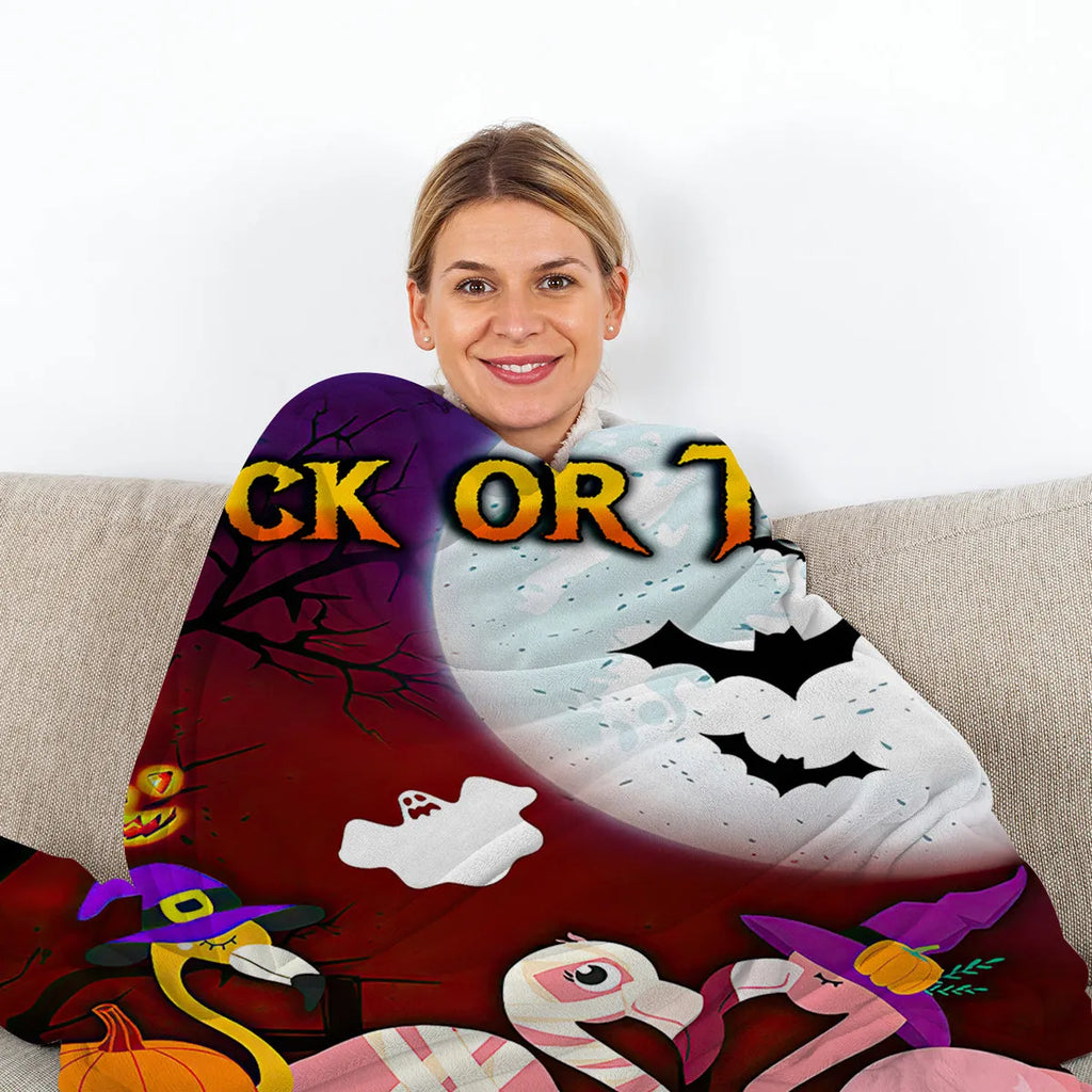 Purple flannel throw blanket with Halloween flamingo print, soft velvet texture, hemmed edges, available in multiple sizes