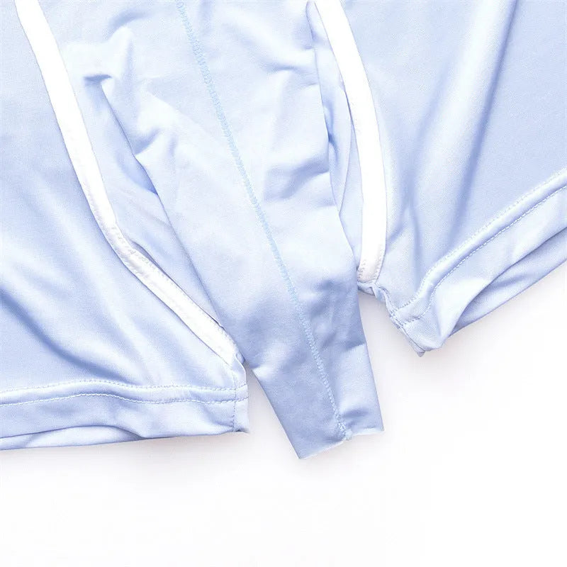 Men's solid colour Ice Silk boxer shorts laid flat, showing mid waist design and fabric texture.