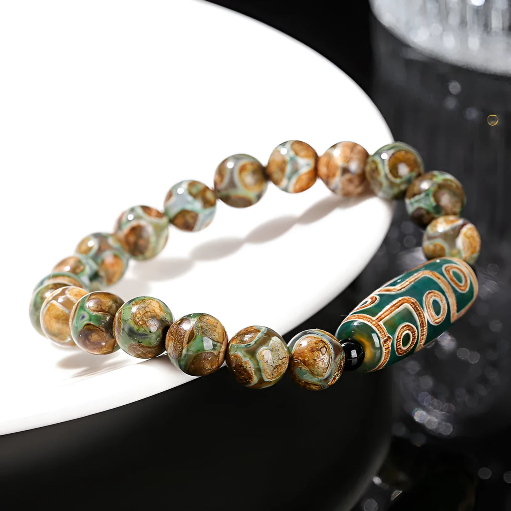 Green dzi bead barrel shaped bracelet with 8mm beads and handmade finish