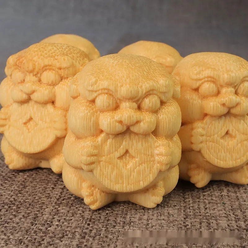 Solid bamboo carving ornament measuring 4.5cm tall by 3.5cm wide with traditional decorative carving