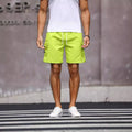 Men's loose fit work shorts in cool silk cotton polyester fabric, available in fluorescent green and army green colours