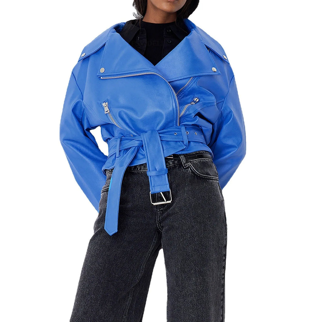 Black punk style leather jacket with a Peter Pan collar and drawstring waist on a hanger.