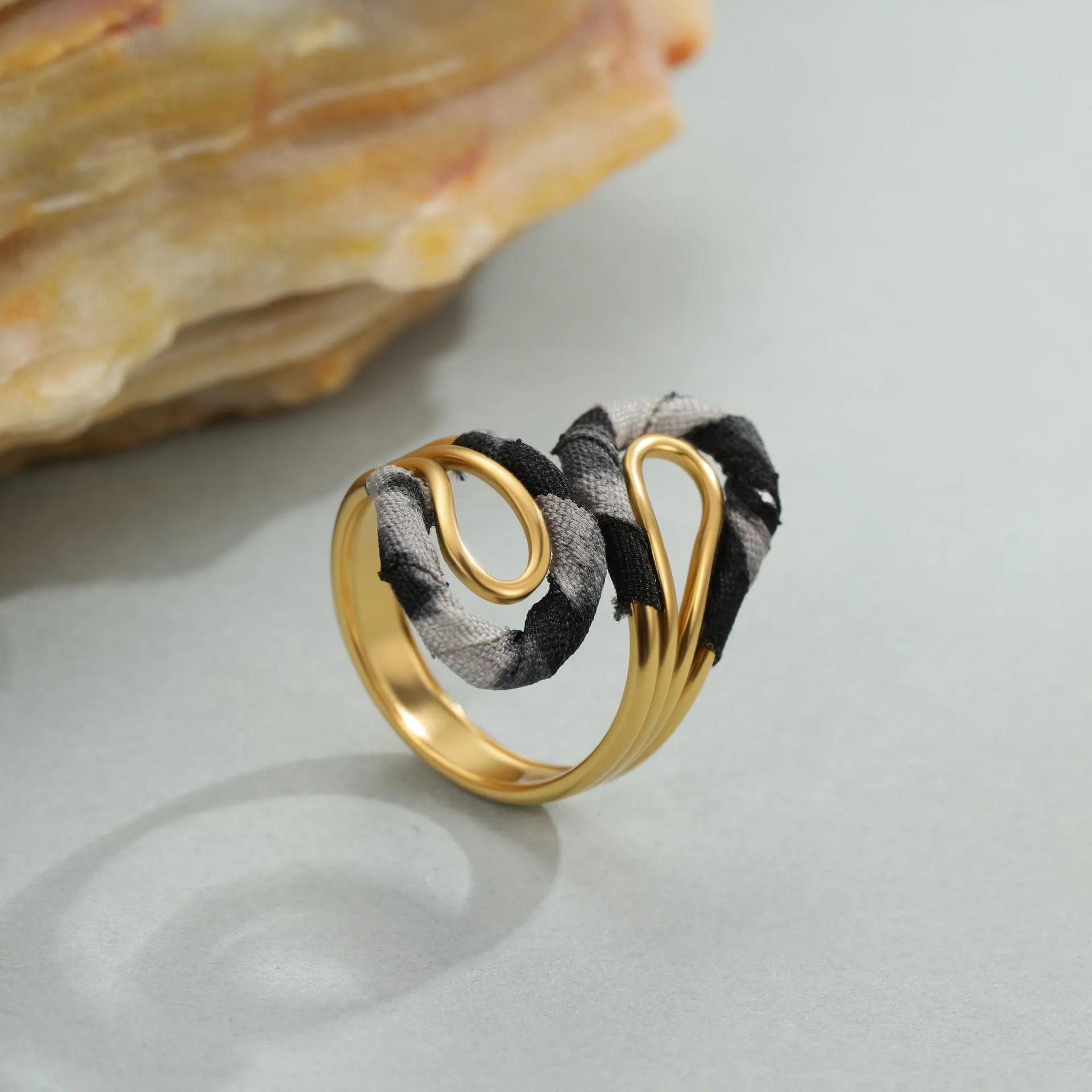 Open mouth stainless steel ring with geometric heart design and leopard print pattern