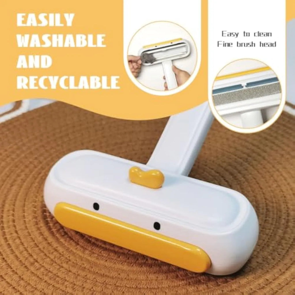 Yellow duck cartoon-style portable pet hair remover with plastic body and bristles.