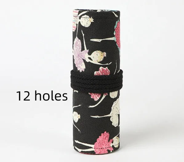 Square canvas pencil case with ballet girl print, showing multiple holes for organising pencils and stationery.