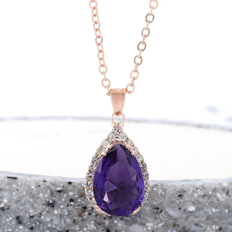 Drop-shape alloy necklace with rhinestone inlay available in eight electroplated colour finishes